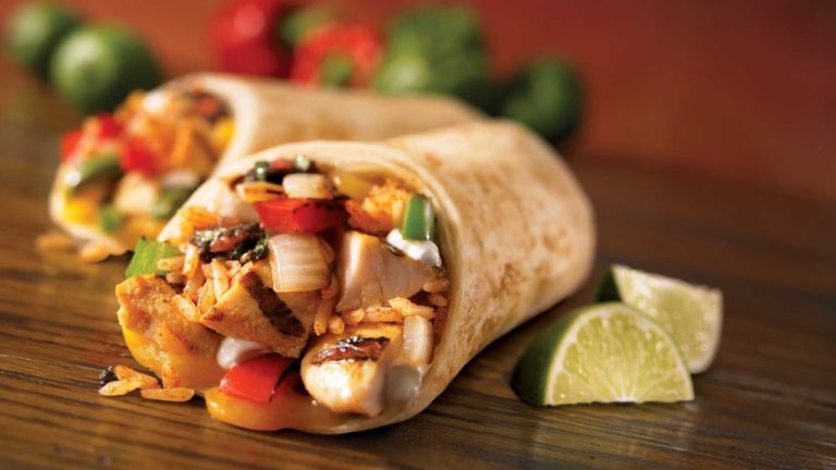 Grilled chicken burrito with rice and lime